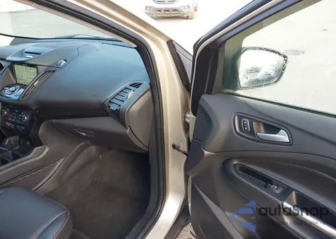 2017 Ford Escape Titanium z USA, uszkodzony, nr VIN 1FMCU9J95HUE99221